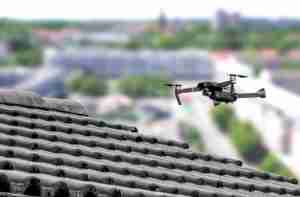 Drone flying over roof