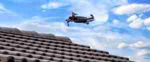 drone flying over a roof