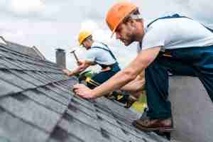 men on roof