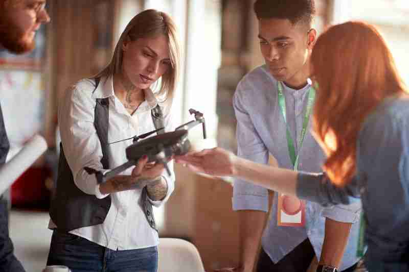 woman learning about drones